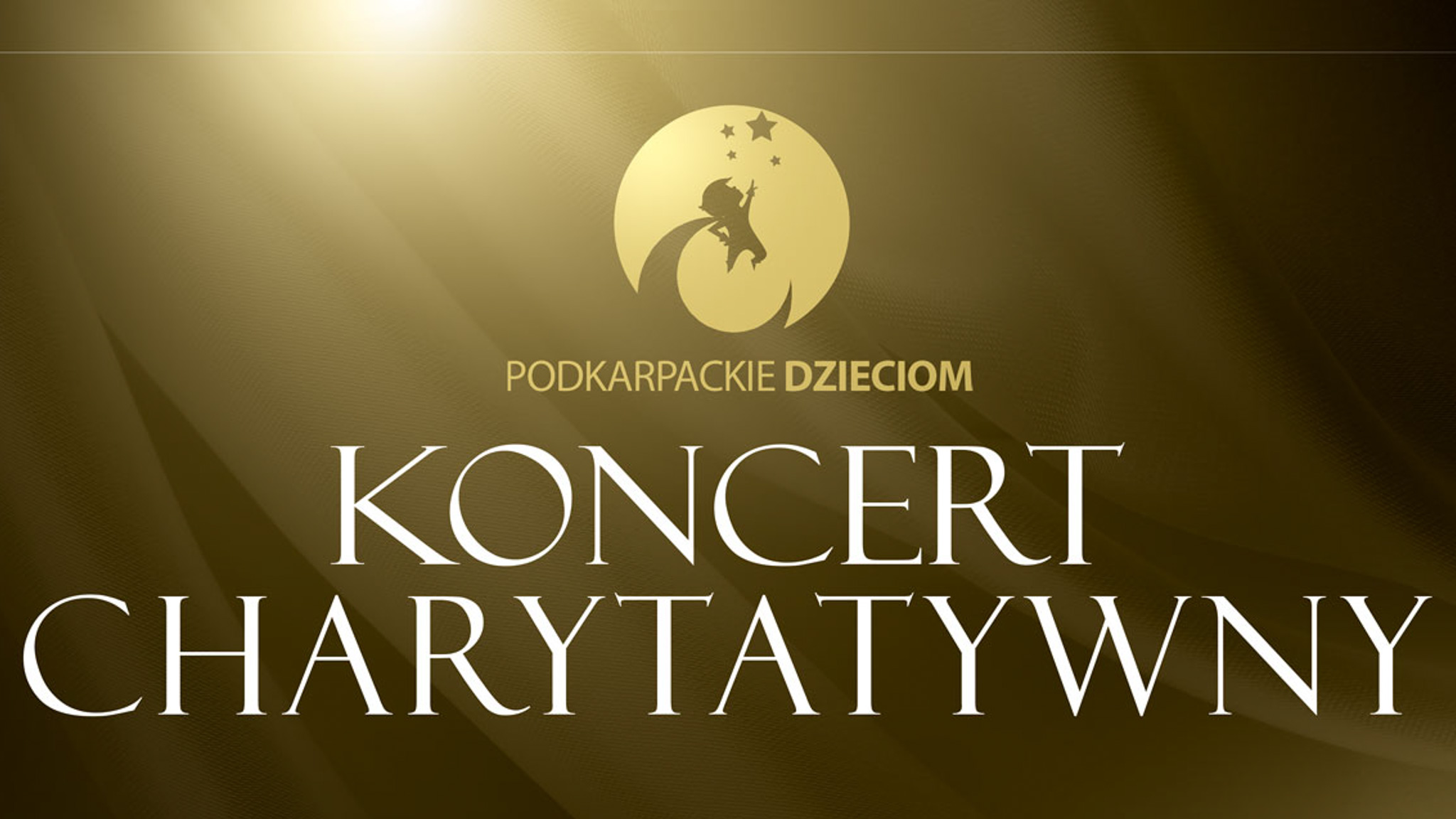 Napis "Koncert Charytatywny" na złotym tel.